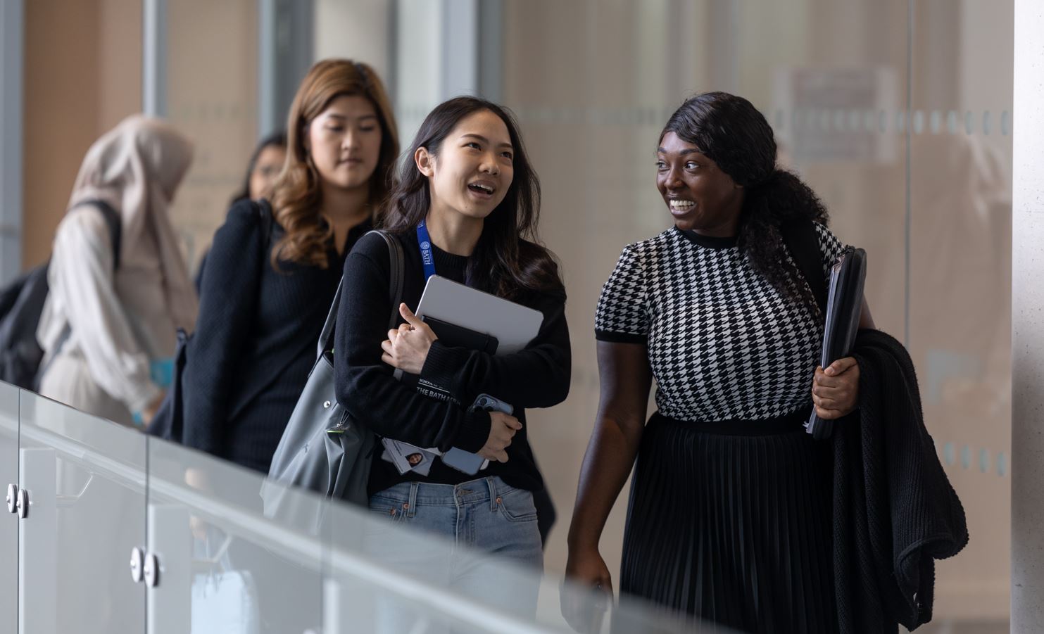 Bath MBA students walking around the School of Management building