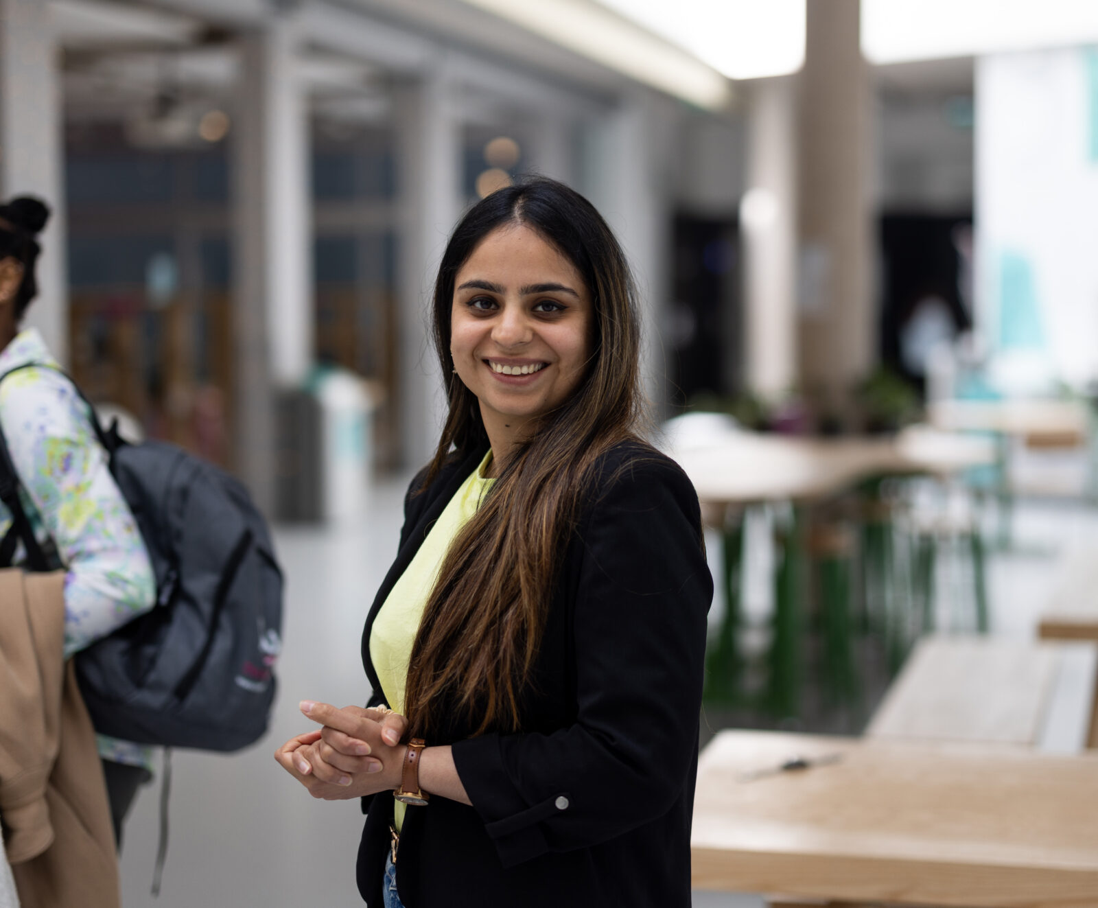 An MBA student smiling