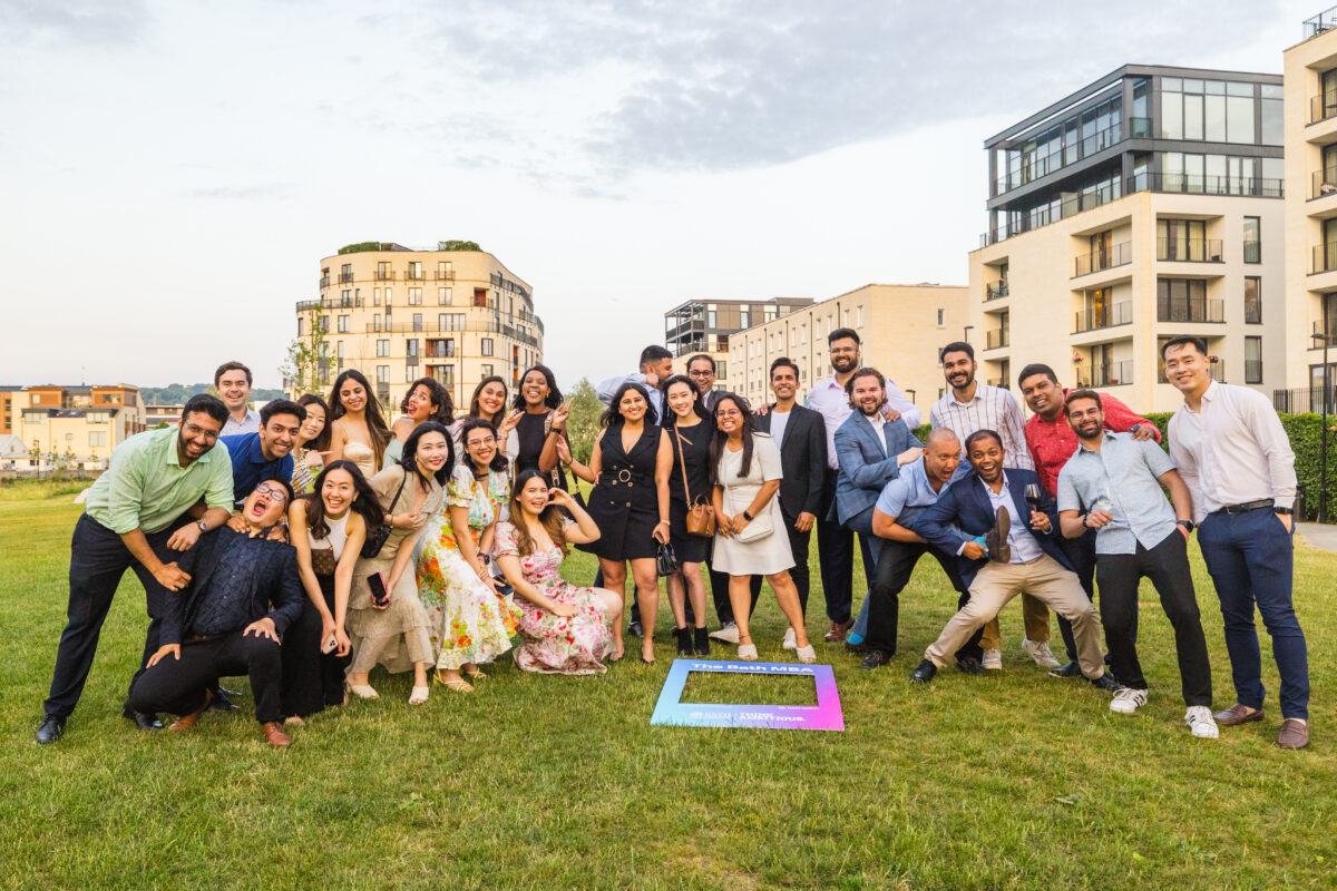 A group of MBA students celebrating graduation